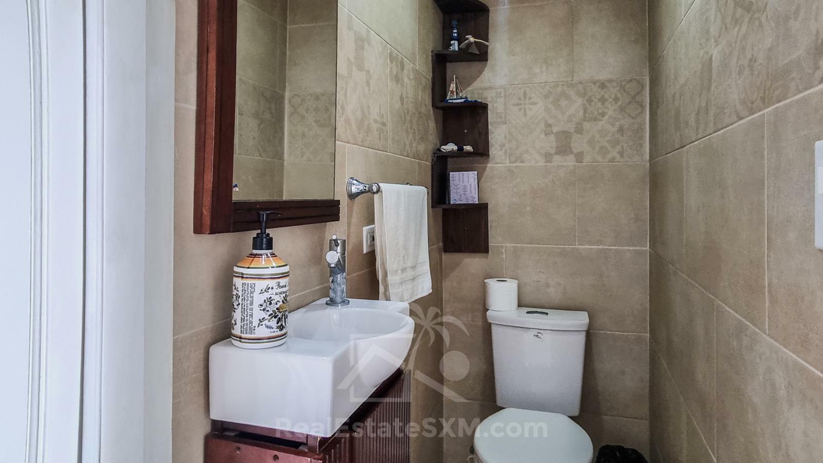 St Maarten home FOR SALE 2-bedroom condo Ocean-Front in Point Blanche. Swimming Pool. 