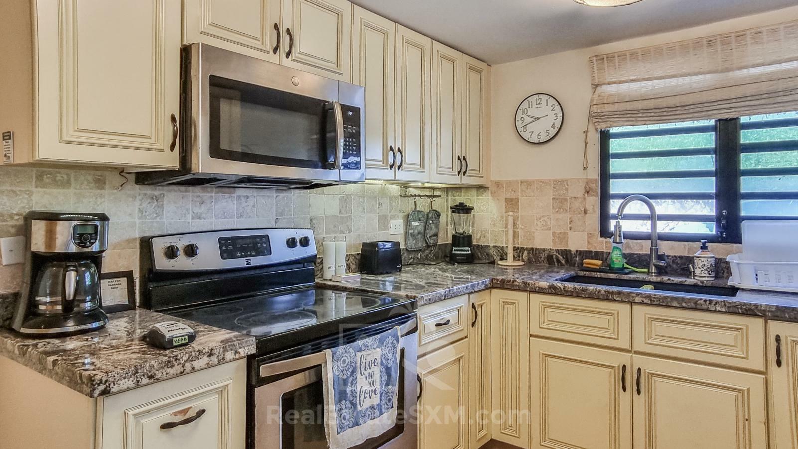 St Maarten home FOR SALE 2-bedroom condo Ocean-Front in Point Blanche. Swimming Pool. 
