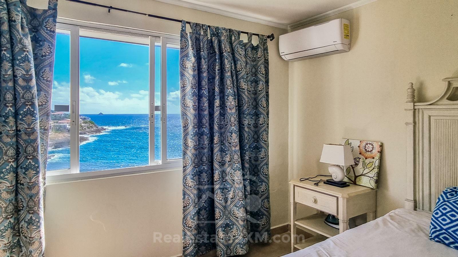 St Maarten home FOR SALE 2-bedroom condo Ocean-Front in Point Blanche. Swimming Pool. 