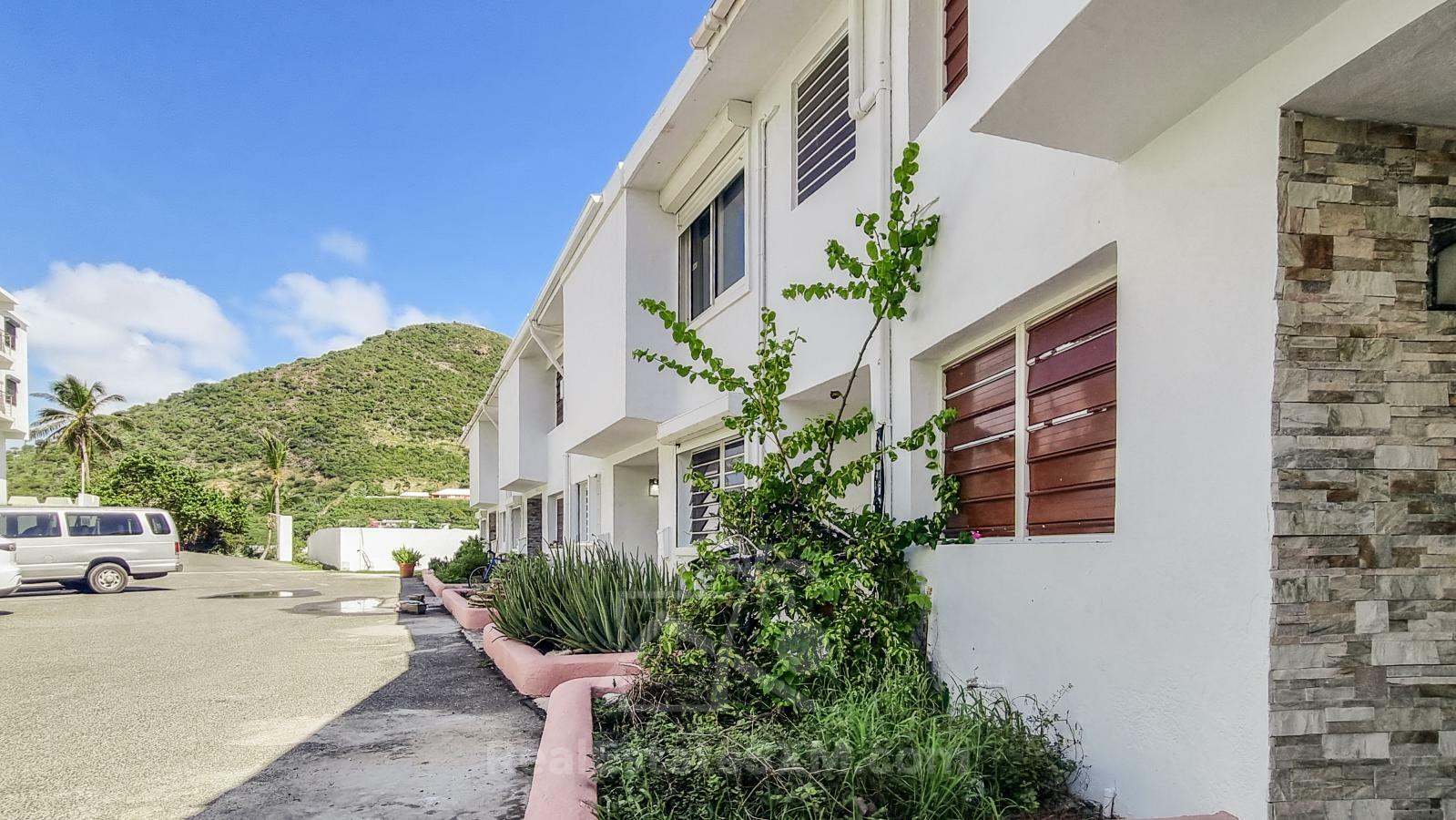 St Maarten home FOR SALE 2-bedroom condo Ocean-Front in Point Blanche. Swimming Pool. 
