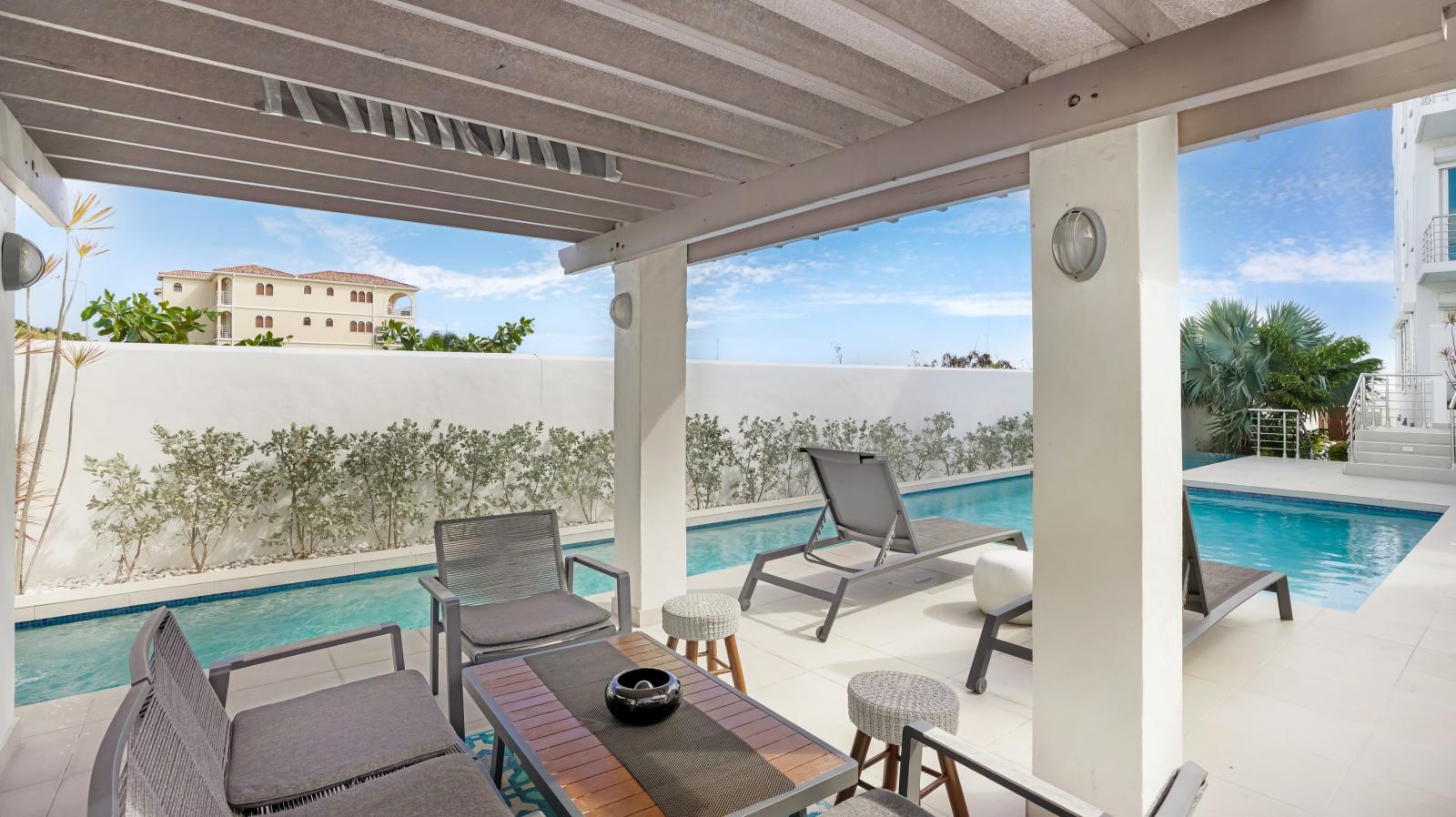 Luxury Modern Beachfront Condo in St Maarten, Simpson Bay Beach Aqualina. Caribbean Sea Sunsets view