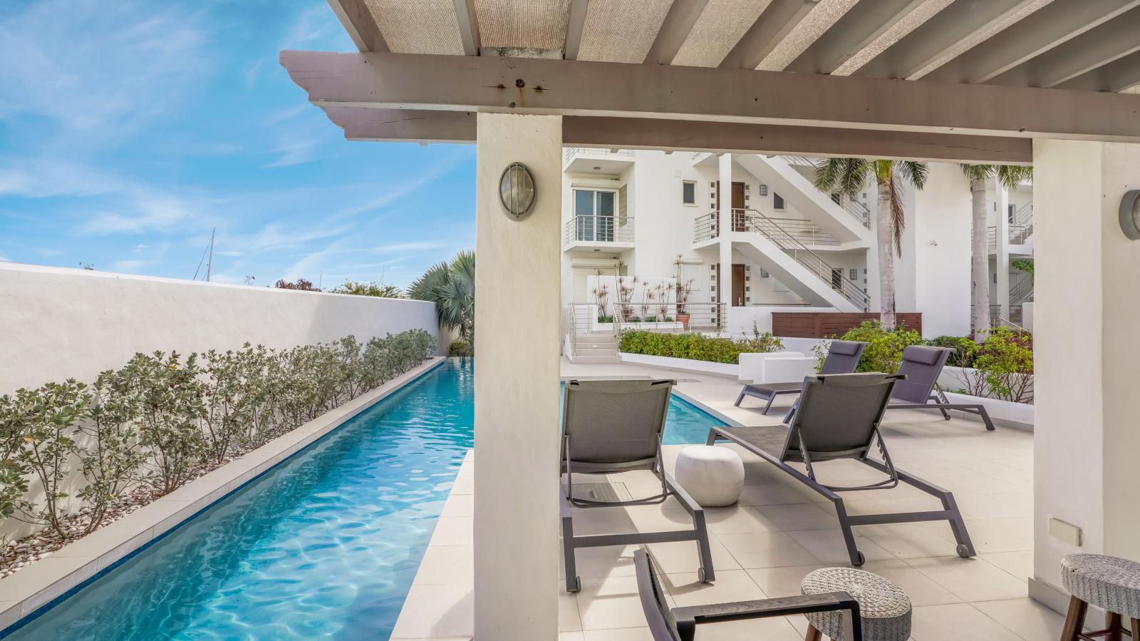 Luxury Modern Beachfront Condo in St Maarten, Simpson Bay Beach Aqualina. Caribbean Sea Sunsets view