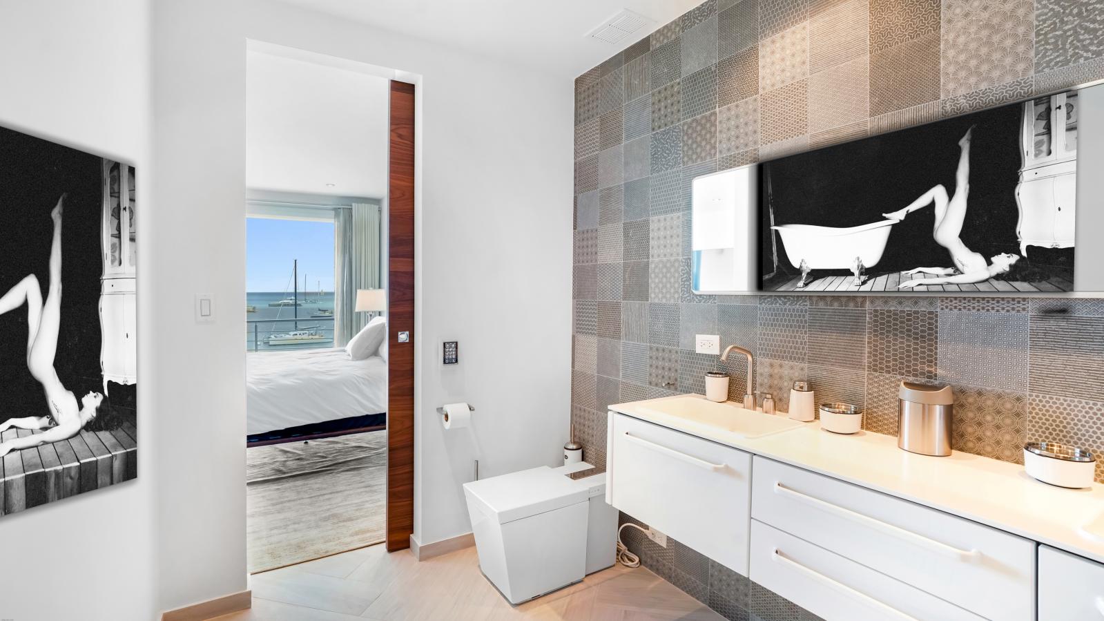 Luxury Modern Beachfront Condo in St Maarten, Simpson Bay Beach Aqualina. Caribbean Sea Sunsets view