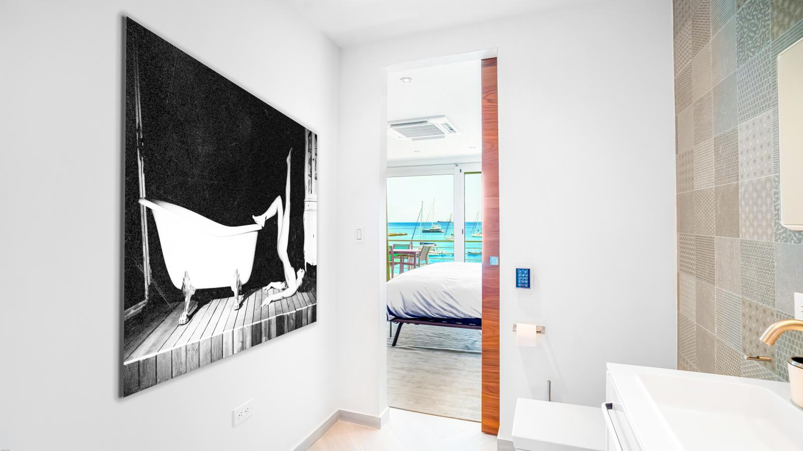 Luxury Modern Beachfront Condo in St Maarten, Simpson Bay Beach Aqualina. Caribbean Sea Sunsets view