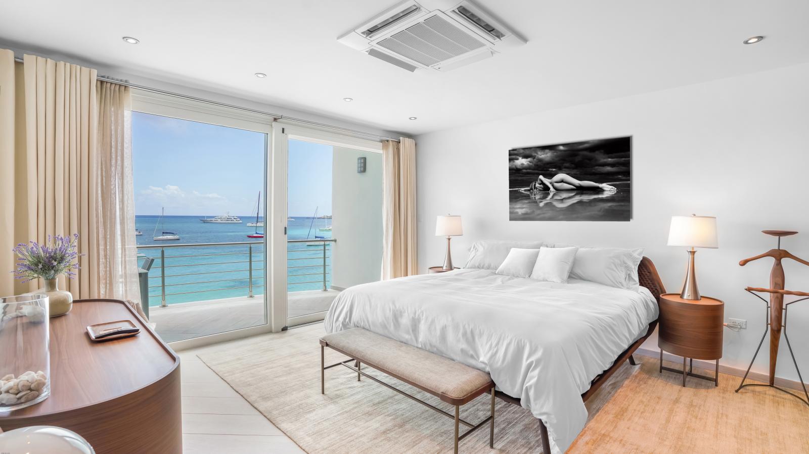 Luxury Modern Beachfront Condo in St Maarten, Simpson Bay Beach Aqualina. Caribbean Sea Sunsets view