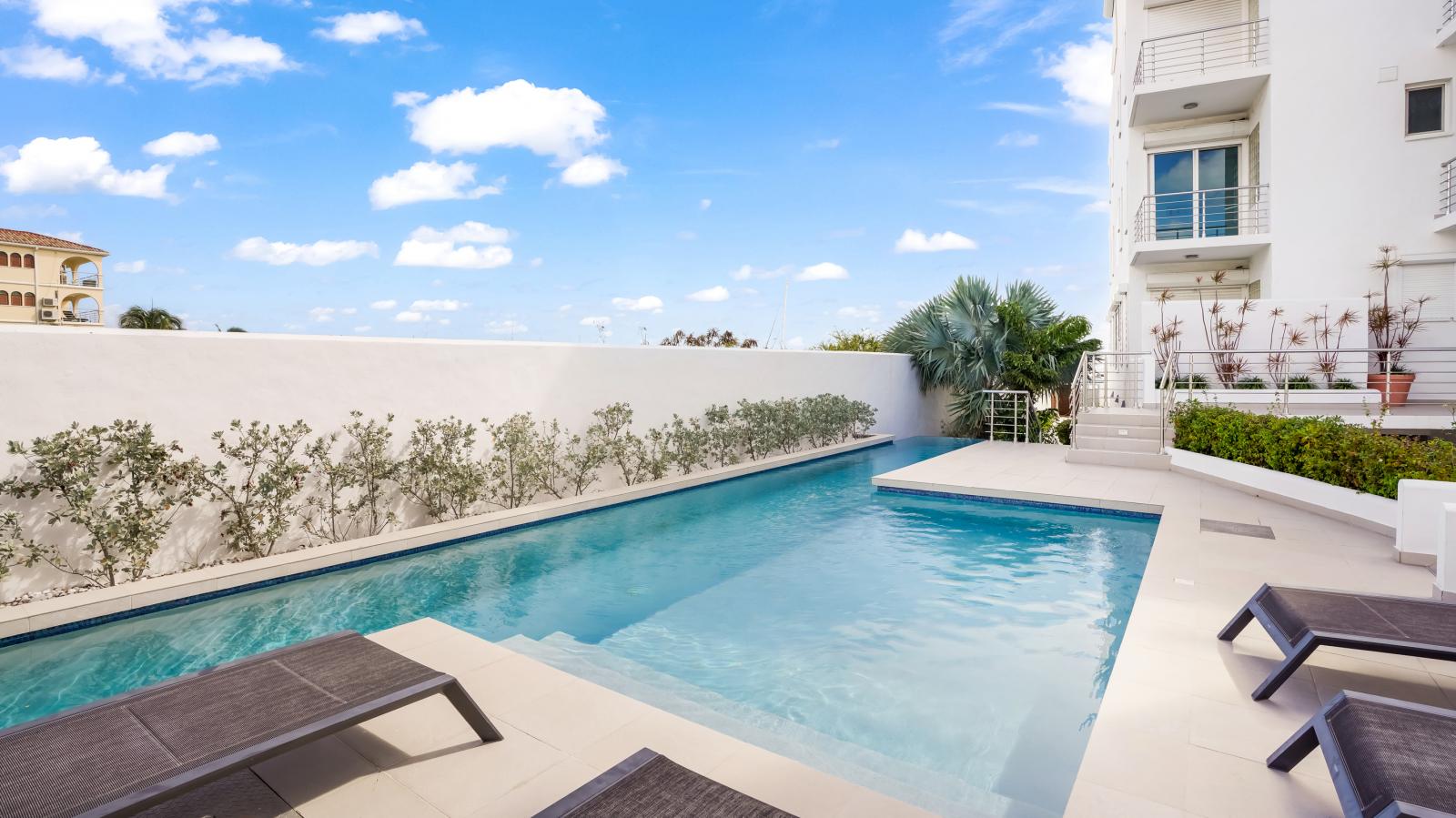 Luxury Modern Beachfront Condo in St Maarten, Simpson Bay Beach Aqualina. Caribbean Sea Sunsets view