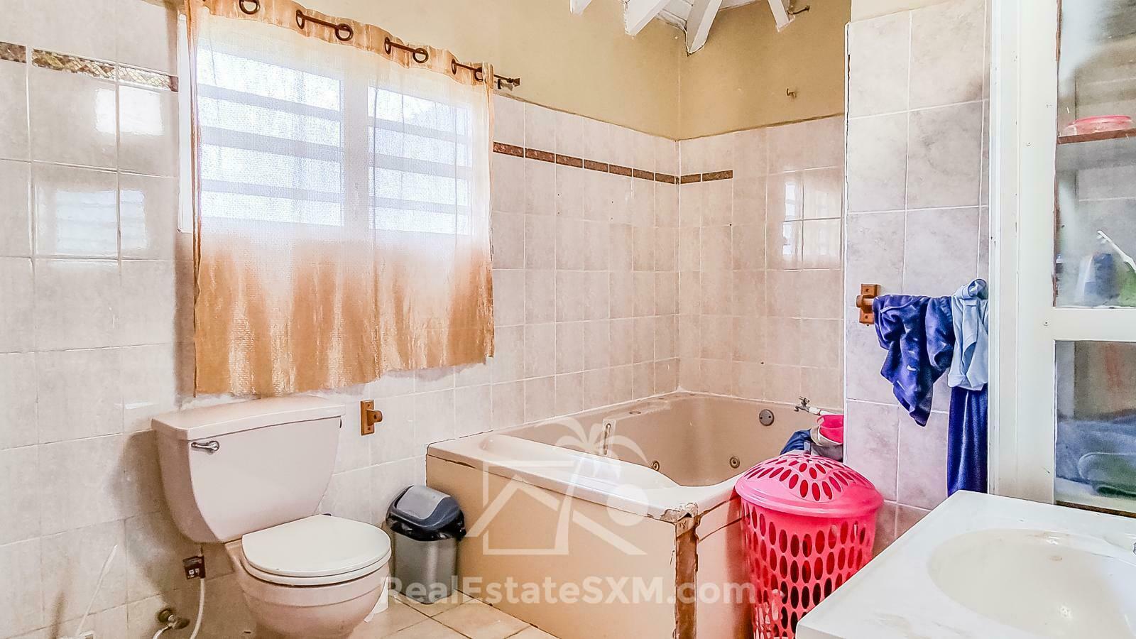 St Maarten House For Sale. Point Blanche. Flat land.  4BR + extra income 2x 1BR. Garage