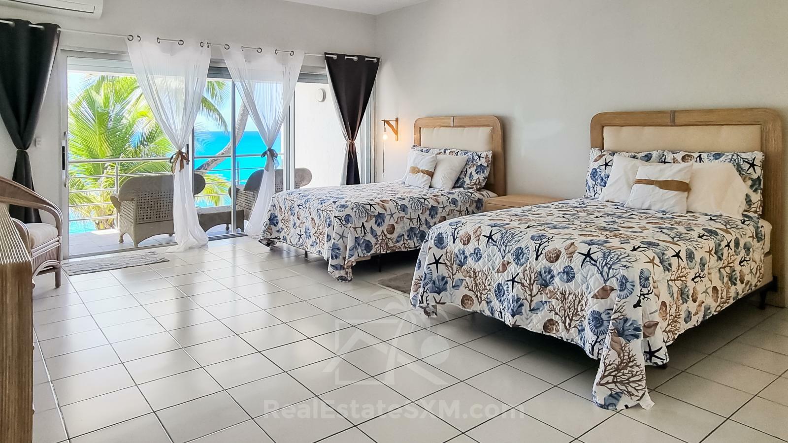 Oceanfront 3-Bedroom Condo in Cupecoy Beach Club SXM. Caribbean Sunsets! Spacious. 2-levels
