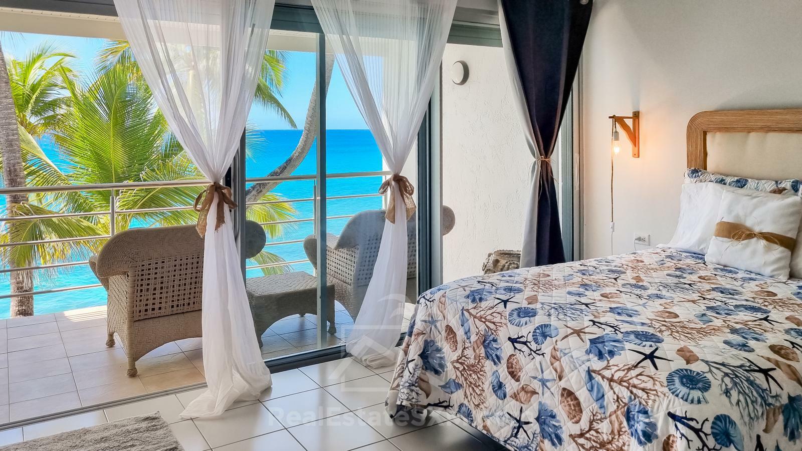 Oceanfront 3-Bedroom Condo in Cupecoy Beach Club SXM. Caribbean Sunsets! Spacious. 2-levels