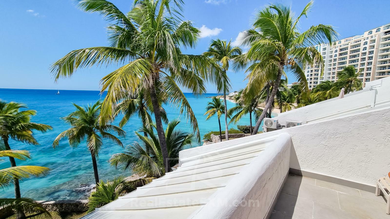 Oceanfront 3-Bedroom Condo in Cupecoy Beach Club SXM. Caribbean Sunsets! Spacious. 2-levels