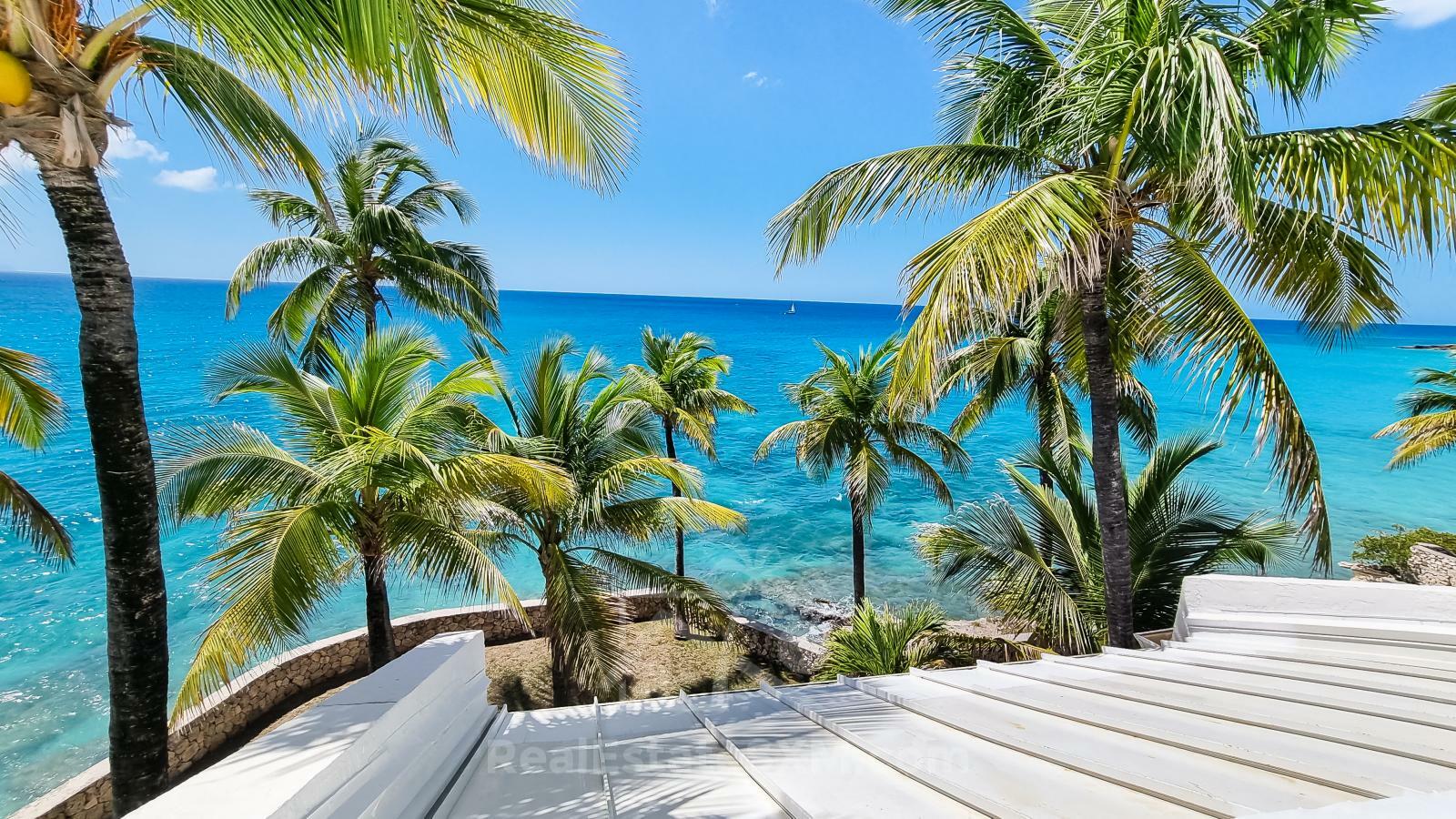 Oceanfront 3-Bedroom Condo in Cupecoy Beach Club SXM. Caribbean Sunsets! Spacious. 2-levels