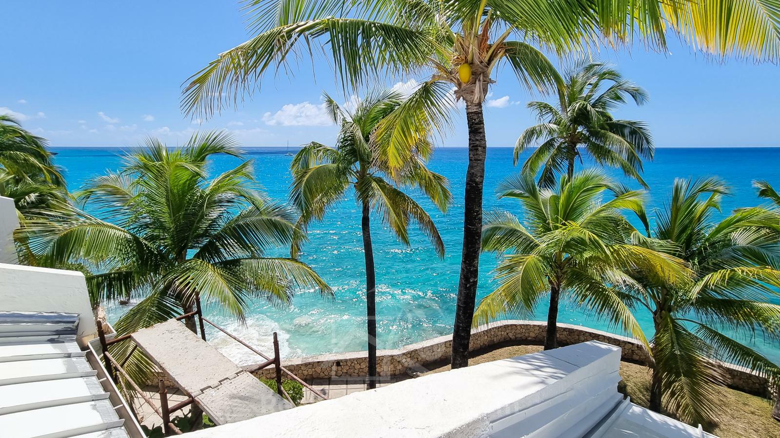 Oceanfront 3-Bedroom Condo in Cupecoy Beach Club SXM. Caribbean Sunsets! Spacious. 2-levels