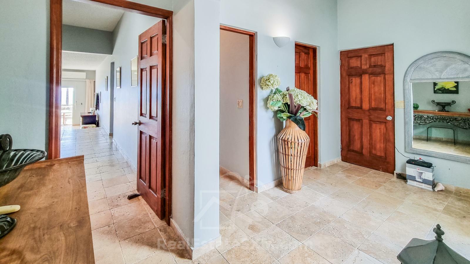 Waterfront condo in St Maarten Cupecoy Beach Club For Sale. Caribbean Sunsets. Private Beach. Gated