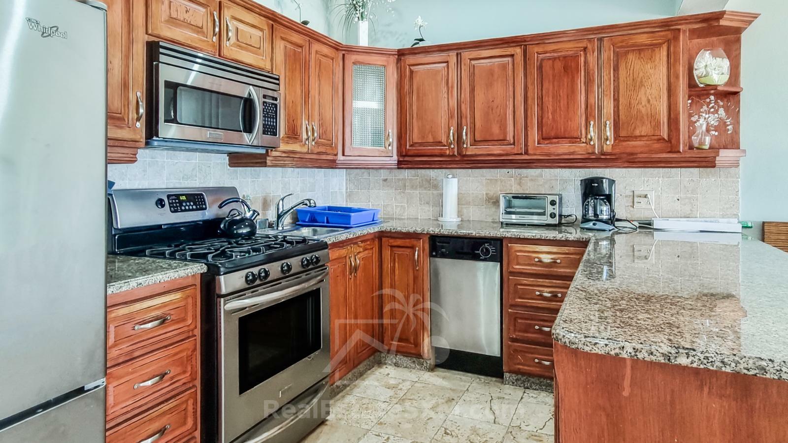 Waterfront condo in St Maarten Cupecoy Beach Club For Sale. Caribbean Sunsets. Private Beach. Gated