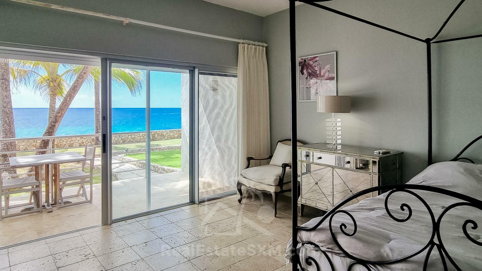 Waterfront condo in St Maarten Cupecoy Beach Club For Sale. Caribbean Sunsets. Private Beach. Gated