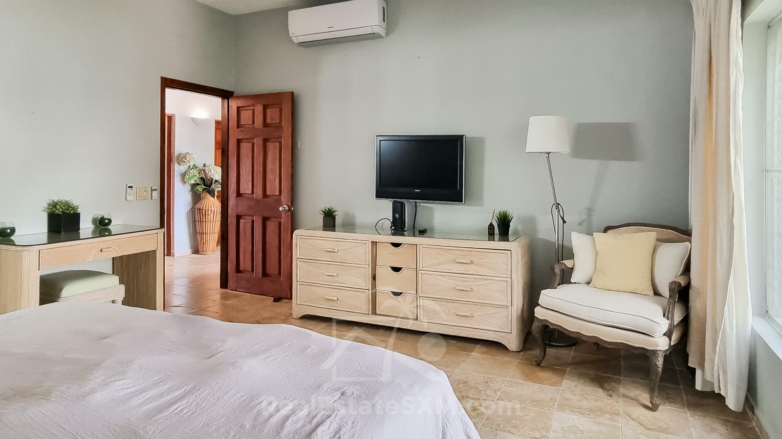 Waterfront condo in St Maarten Cupecoy Beach Club For Sale. Caribbean Sunsets. Private Beach. Gated