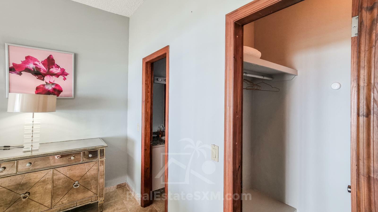 Waterfront condo in St Maarten Cupecoy Beach Club For Sale. Caribbean Sunsets. Private Beach. Gated