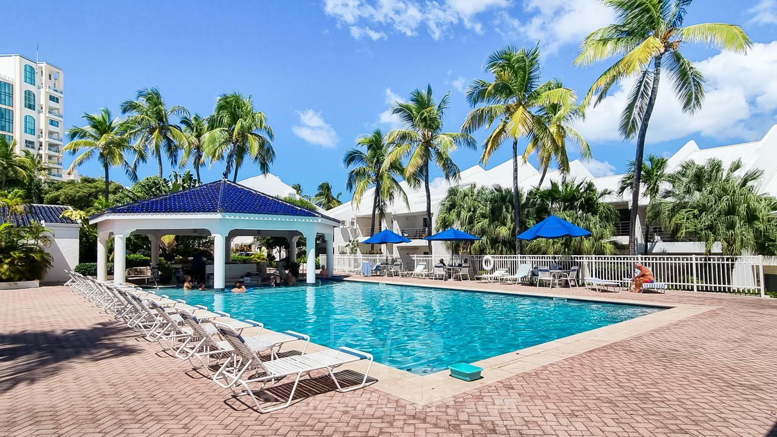 Waterfront condo in St Maarten Cupecoy Beach Club For Sale. Caribbean Sunsets. Private Beach. Gated
