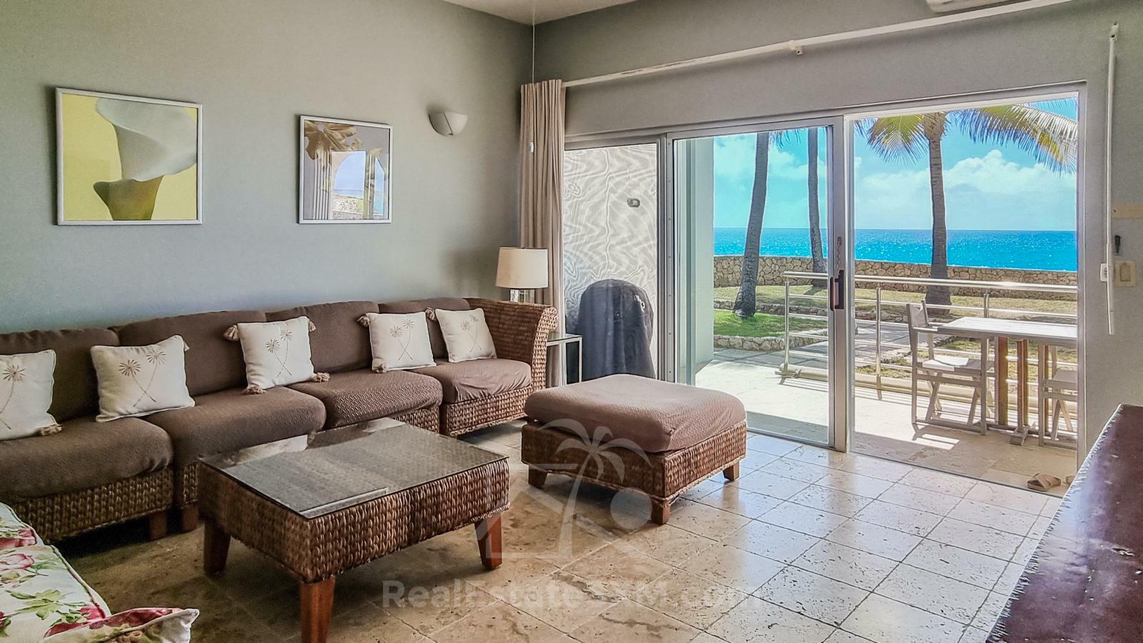 Waterfront condo in St Maarten Cupecoy Beach Club For Sale. Caribbean Sunsets. Private Beach. Gated