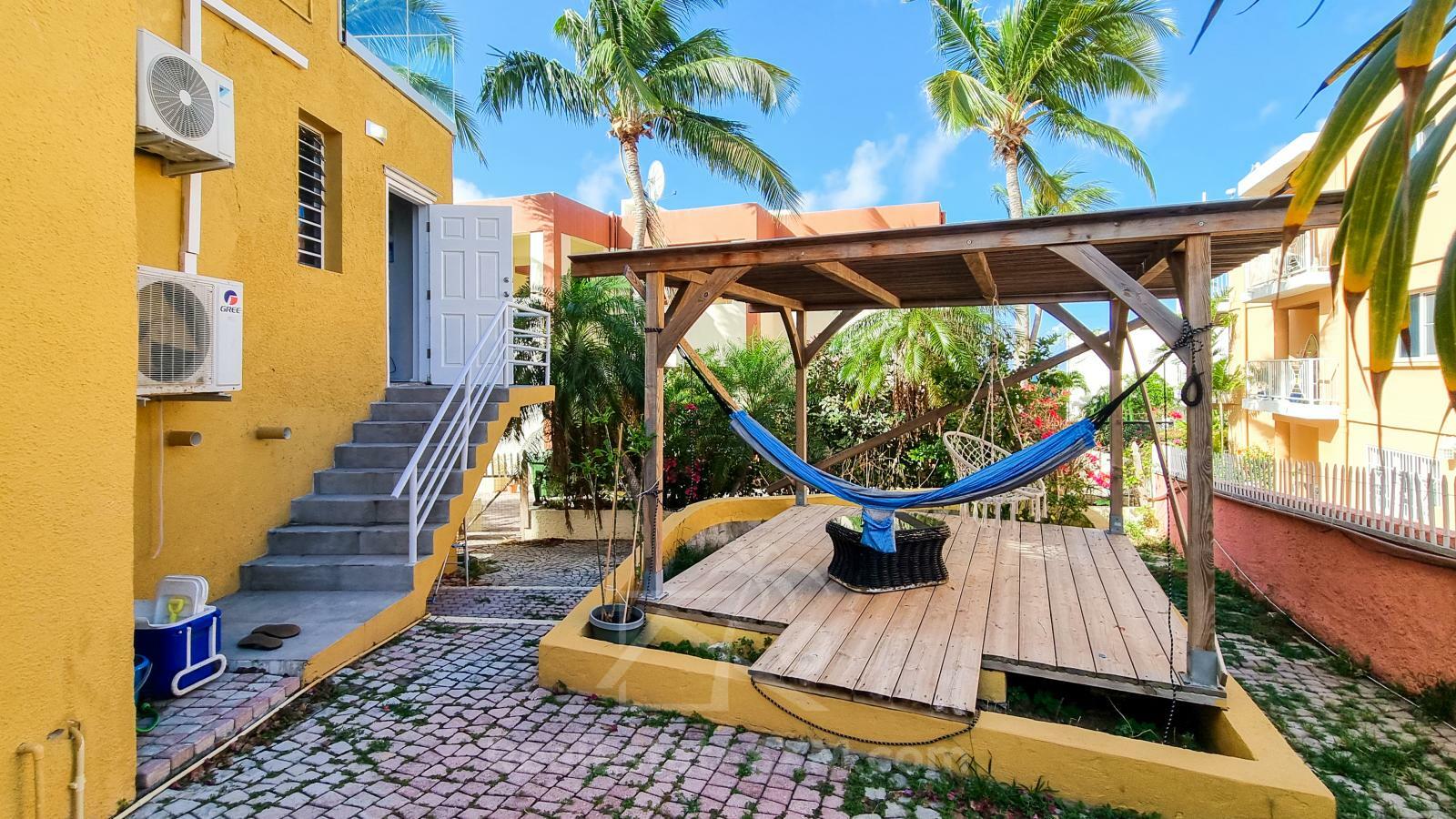 FOR RENT Corner Townhouse with Stunning Caribbean Sea Views in Pelican Key SXM. Yard. Prime location
