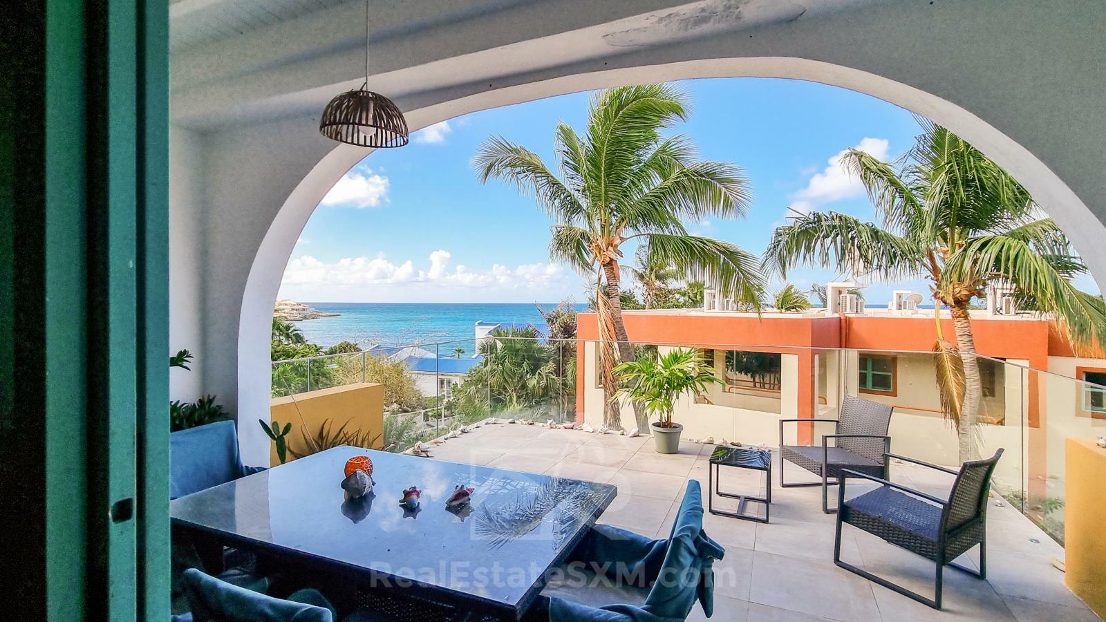 FOR RENT Corner Townhouse with Stunning Caribbean Sea Views in Pelican Key SXM. Yard. Prime location