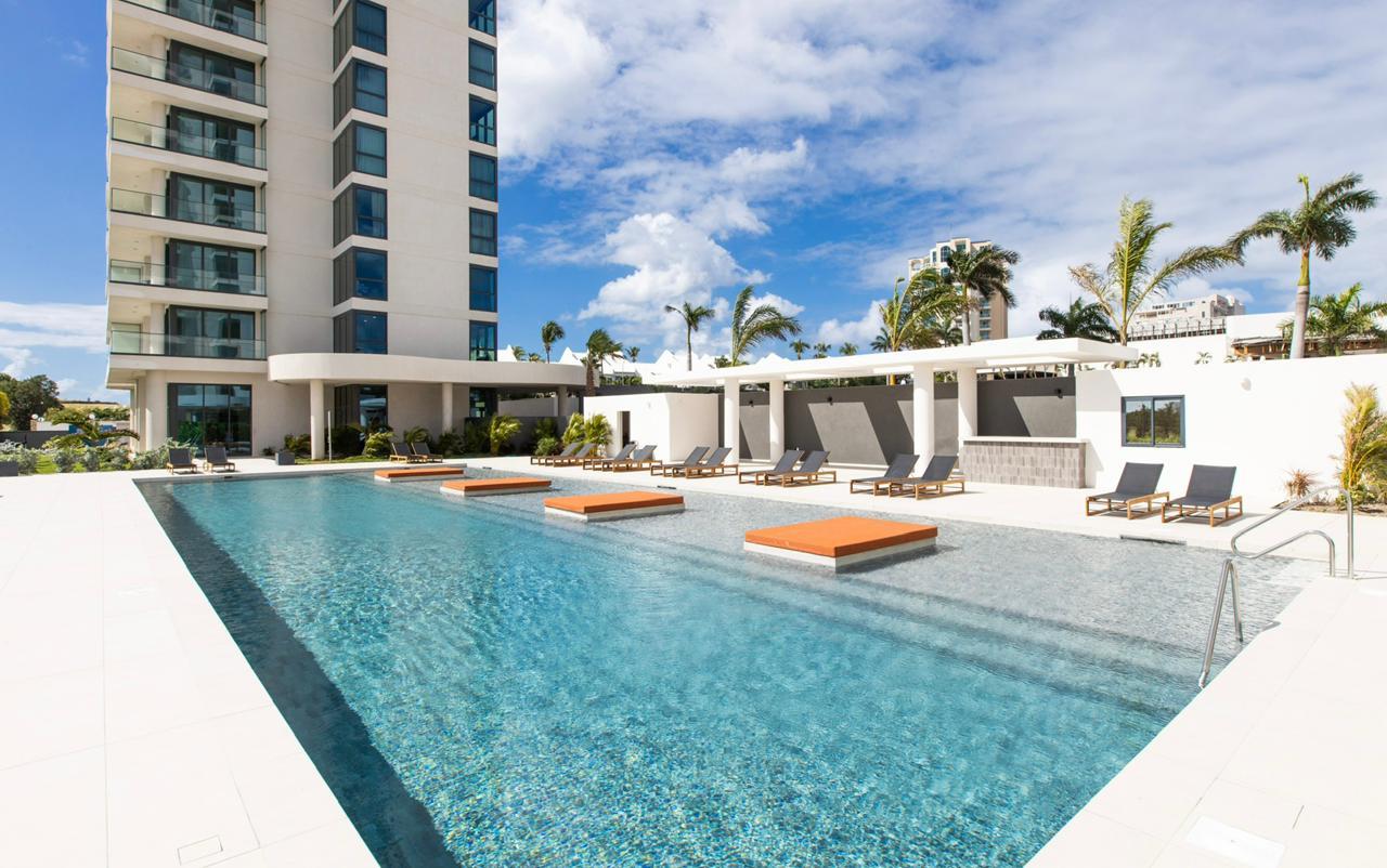 Fourteen 1BR Condo at Mullet Bay Beach for sale. Corner bedroom unit, ground floor convinience A104