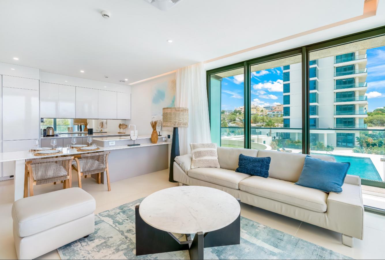 Fourteen 1BR Condo at Mullet Bay Beach for sale. Corner bedroom unit, ground floor convinience A104