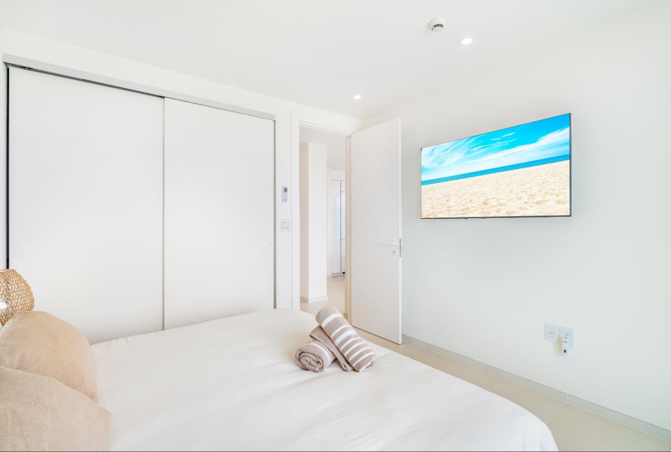 Fourteen 1BR Condo at Mullet Bay Beach for sale. Corner bedroom unit, ground floor convinience A104