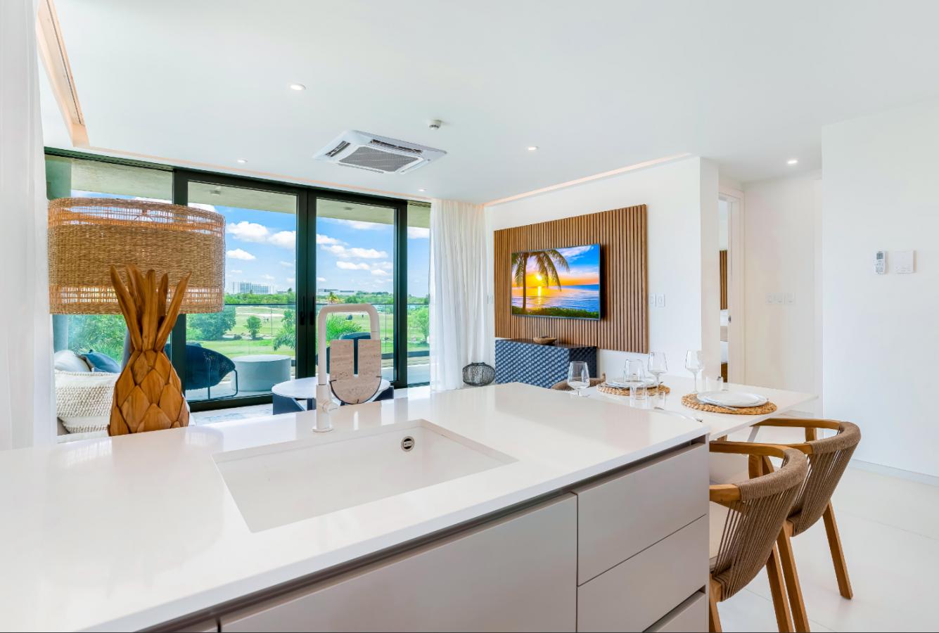 Fourteen 1BR Condo at Mullet Bay Beach for sale. Corner bedroom unit, ground floor convinience A104
