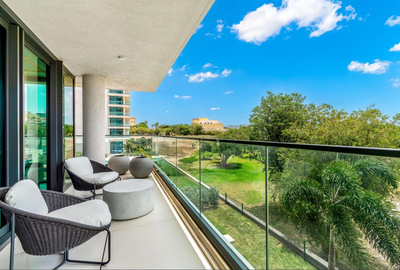 Fourteen 1BR Condo at Mullet Bay Beach for sale. Corner bedroom unit, ground floor convinience A104