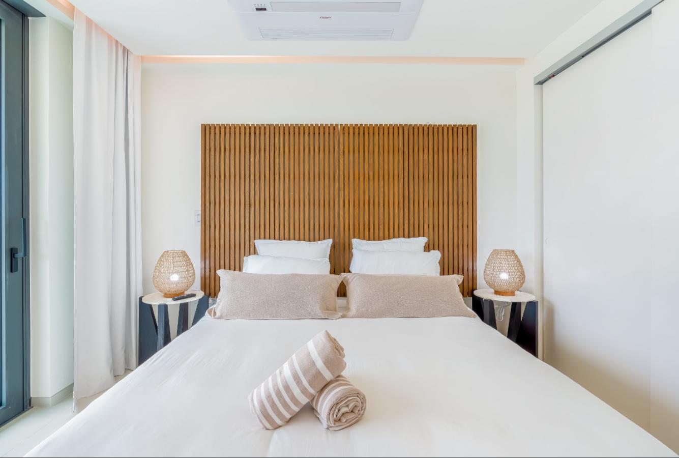 Fourteen 1BR Condo at Mullet Bay Beach for sale. Corner bedroom unit, ground floor convinience A104