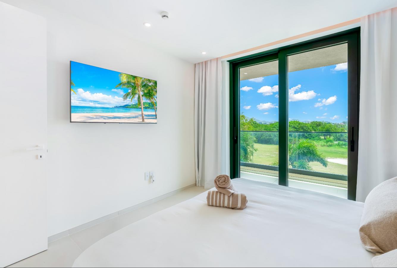 Fourteen 1BR Condo at Mullet Bay Beach for sale. Corner bedroom unit, ground floor convinience A104