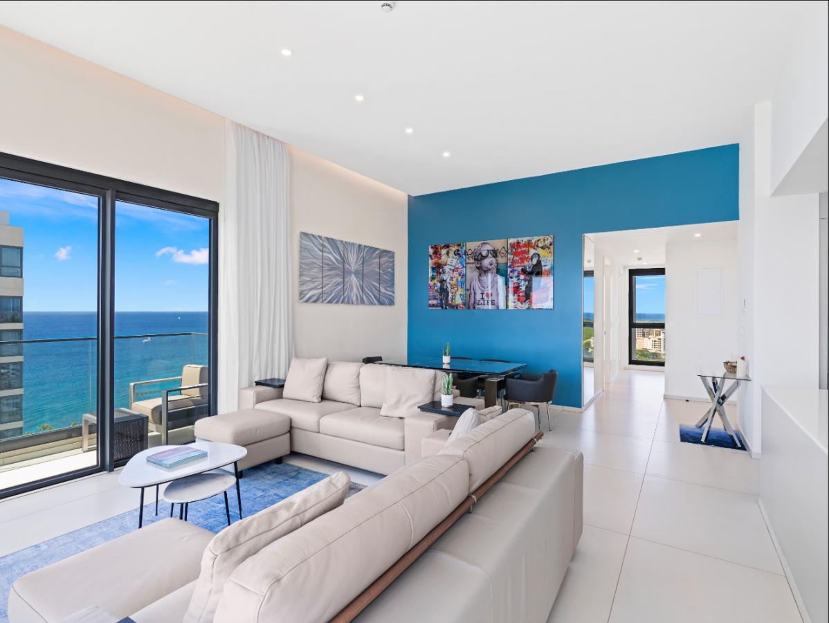 St Maarten real estate: Fourteen Mullet Bay Sub-penthouse ocean view height ceiling 19th floor B1901