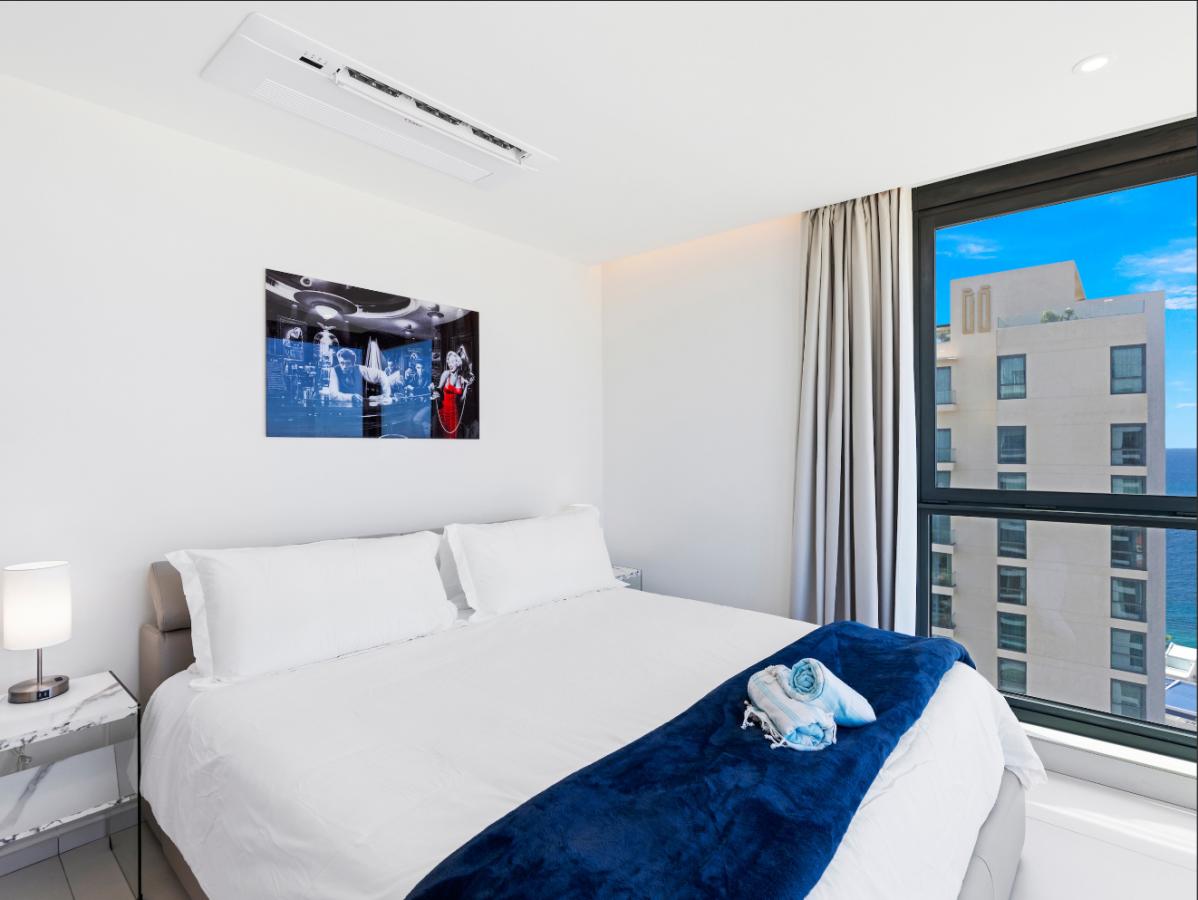 St Maarten real estate: Fourteen Mullet Bay Sub-penthouse ocean view height ceiling 19th floor B1901