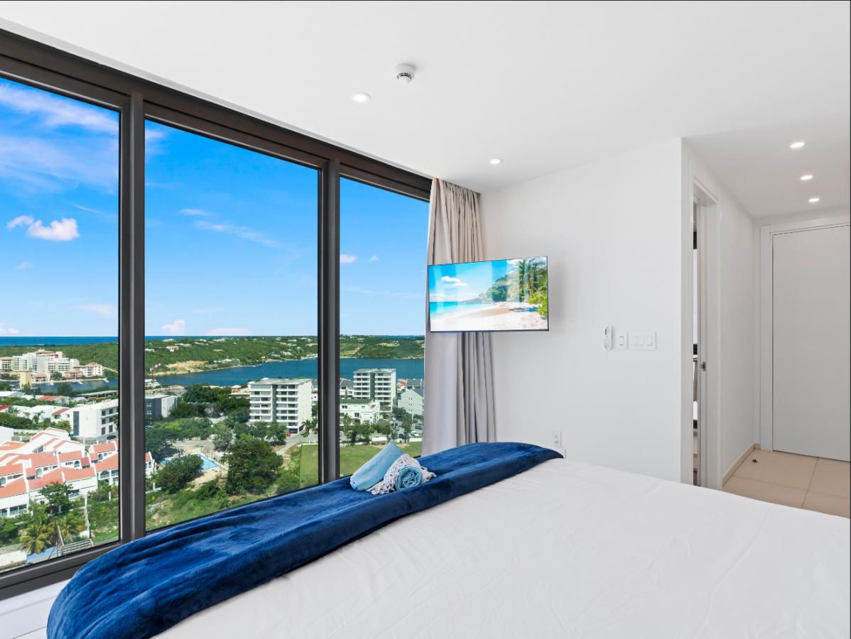 St Maarten real estate: Fourteen Mullet Bay Sub-penthouse ocean view height ceiling 19th floor B1901