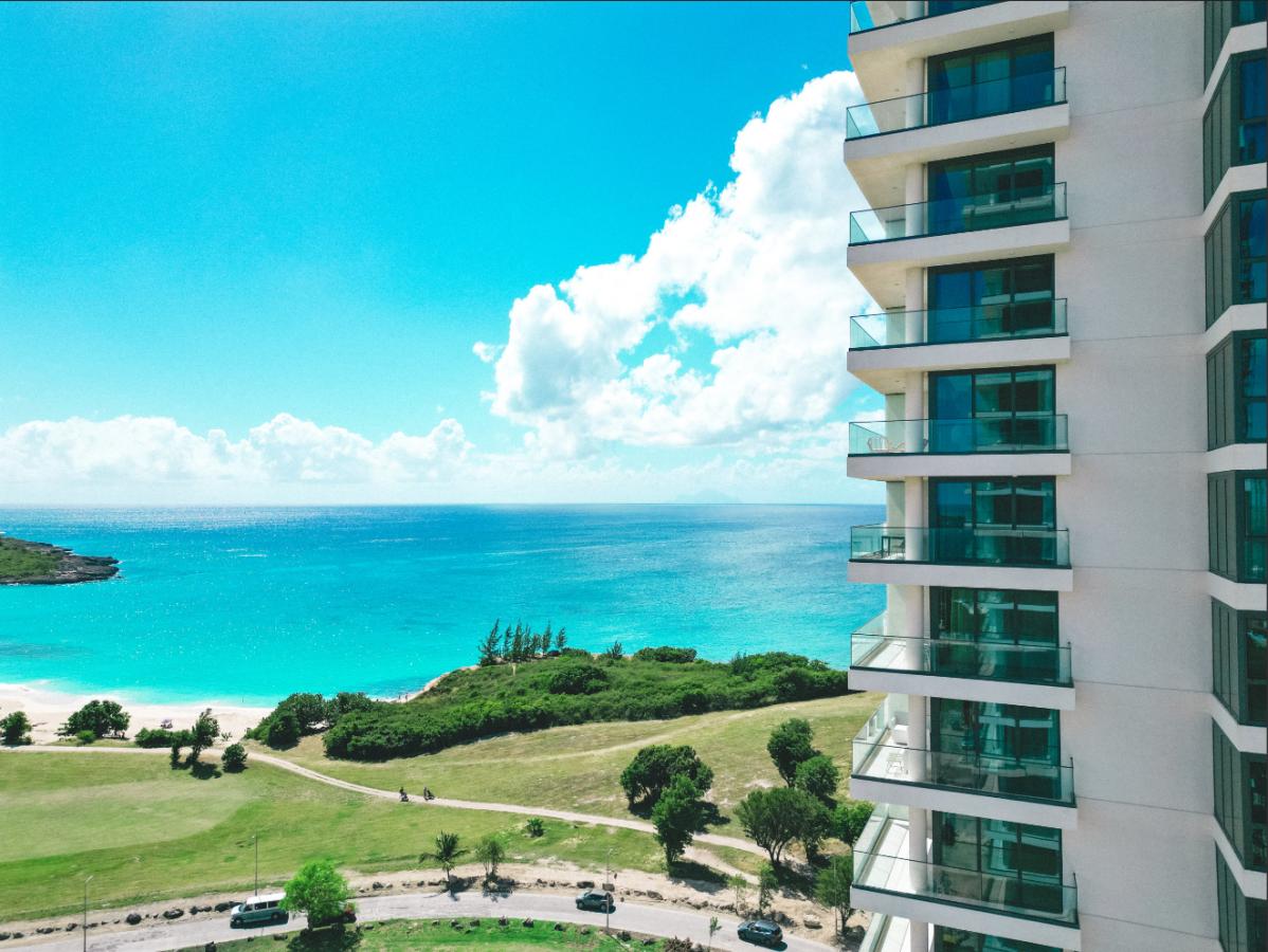 St Maarten real estate: Fourteen Mullet Bay Sub-penthouse ocean view height ceiling 19th floor B1901