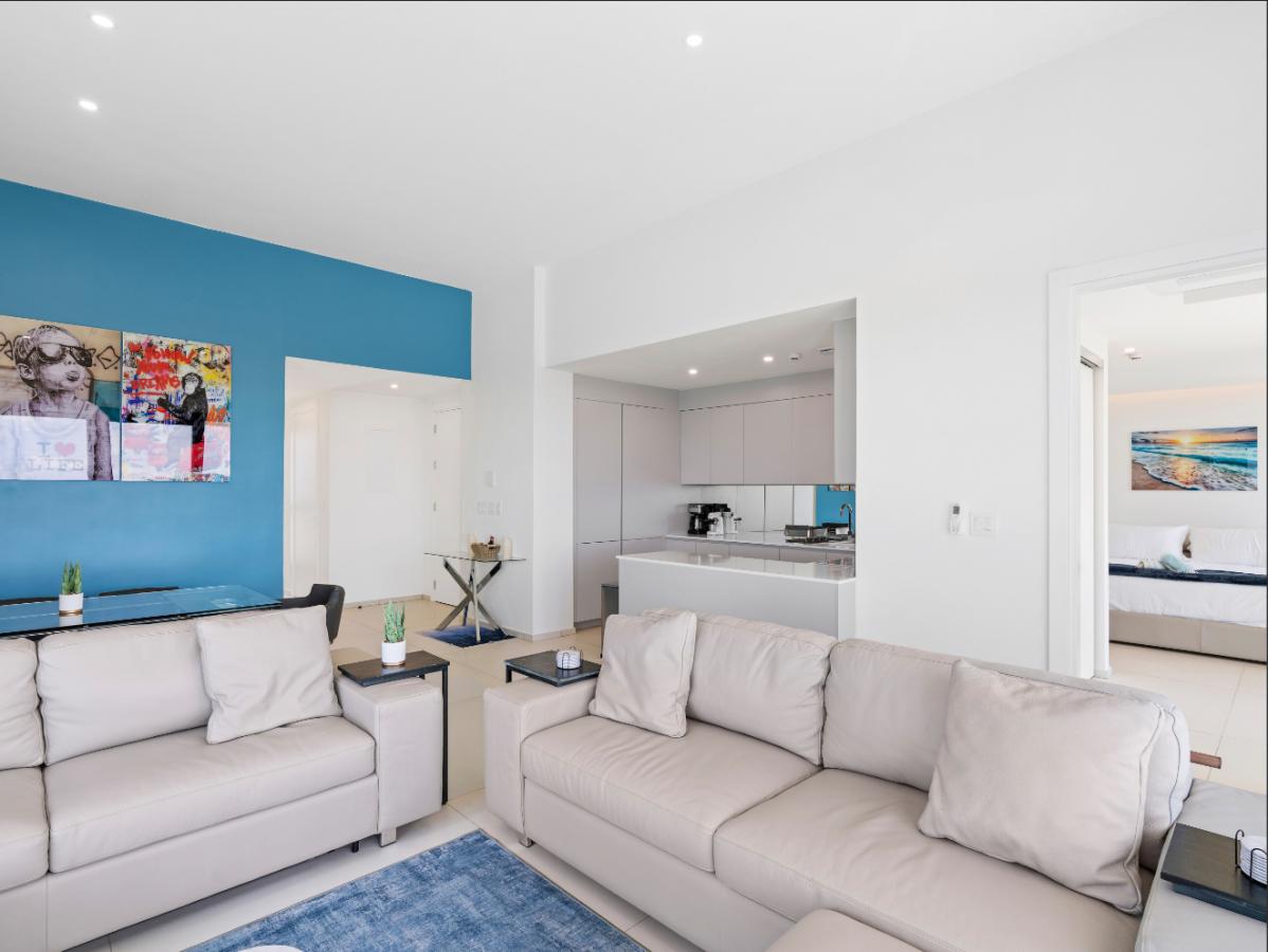 St Maarten real estate: Fourteen Mullet Bay Sub-penthouse ocean view height ceiling 19th floor B1901