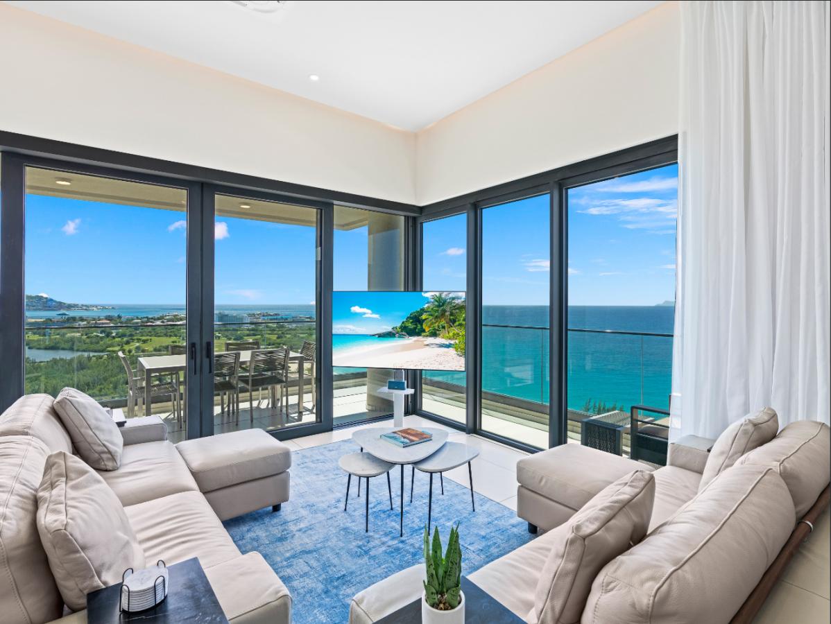 St Maarten real estate: Fourteen Mullet Bay Sub-penthouse ocean view height ceiling 19th floor B1901