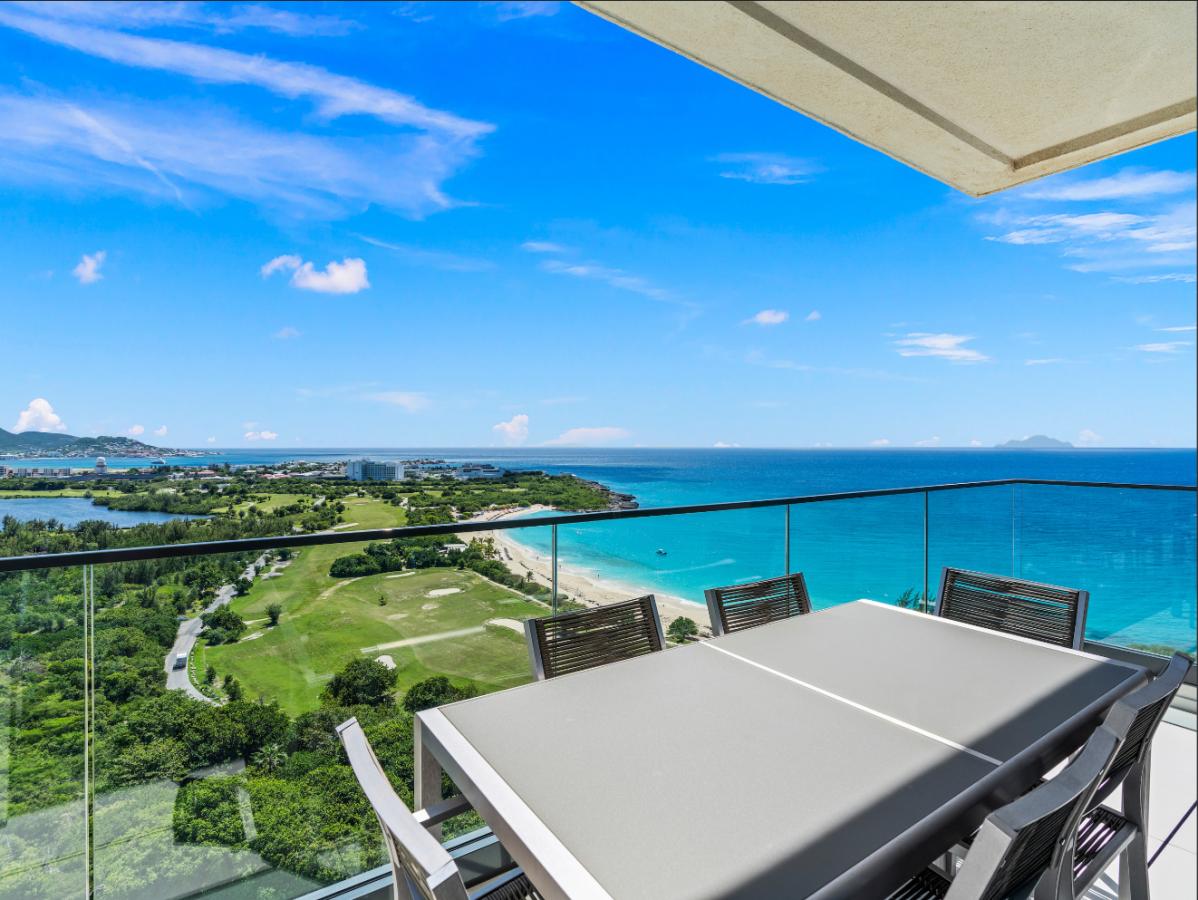 St Maarten real estate: Fourteen Mullet Bay Sub-penthouse ocean view height ceiling 19th floor B1901