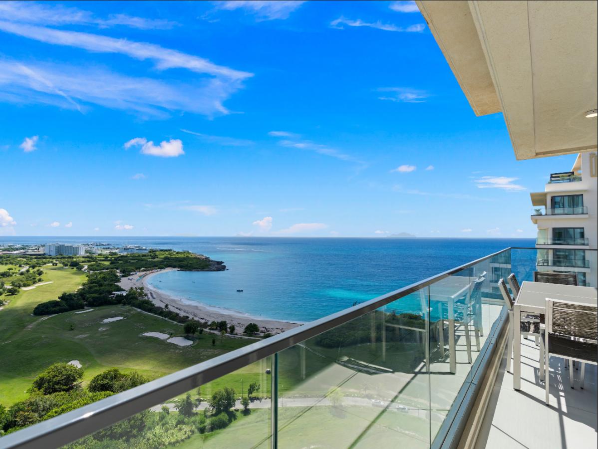 St Maarten real estate: Fourteen Mullet Bay Sub-penthouse ocean view height ceiling 19th floor B1901