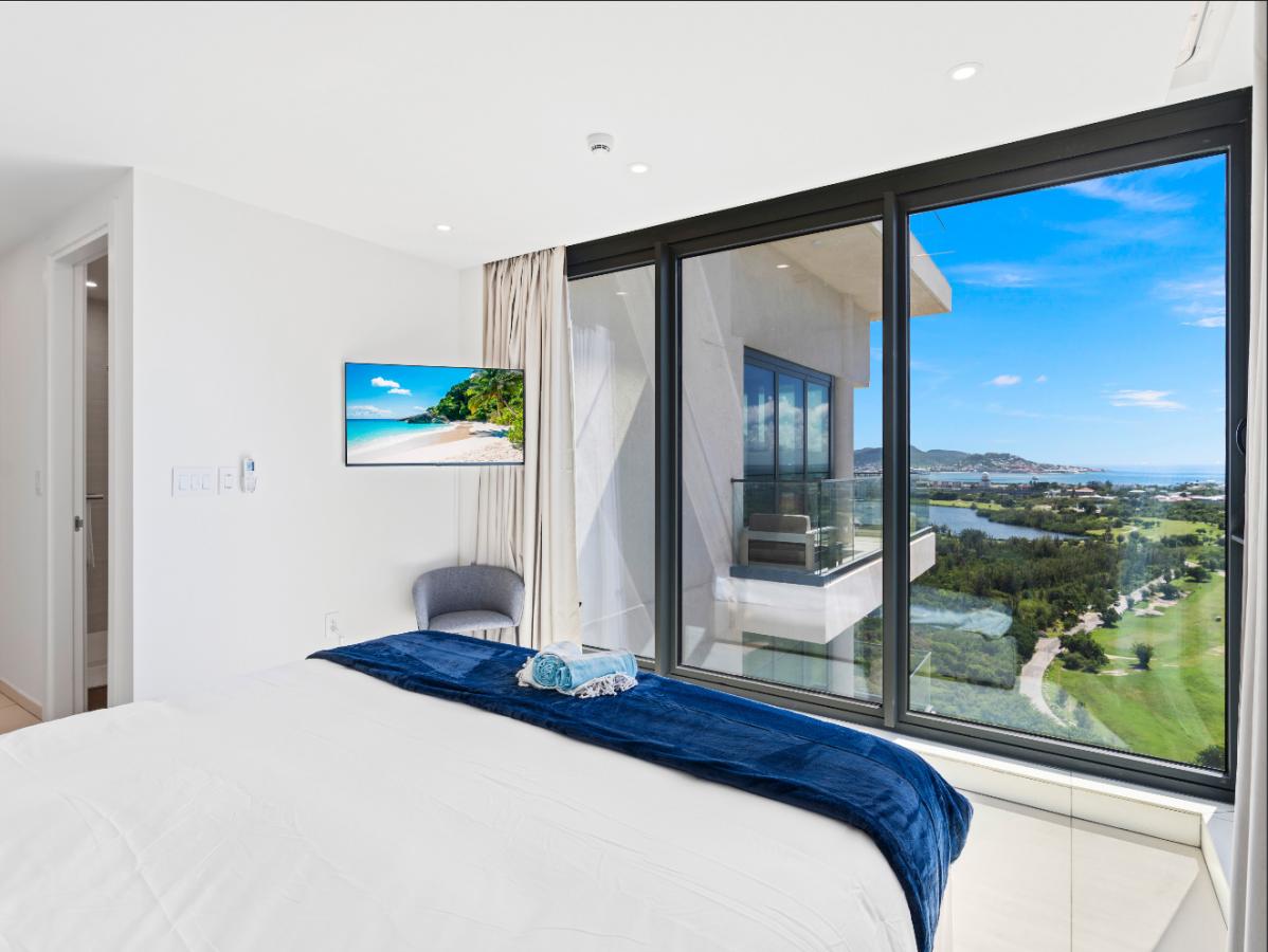 St Maarten real estate: Fourteen Mullet Bay Sub-penthouse ocean view height ceiling 19th floor B1901