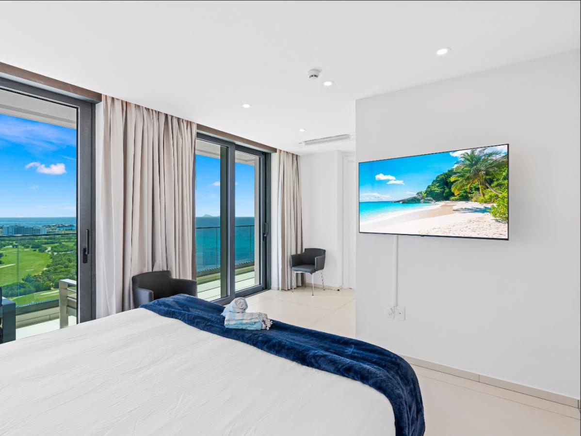 St Maarten real estate: Fourteen Mullet Bay Sub-penthouse ocean view height ceiling 19th floor B1901