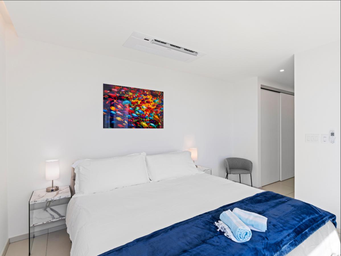 St Maarten real estate: Fourteen Mullet Bay Sub-penthouse ocean view height ceiling 19th floor B1901