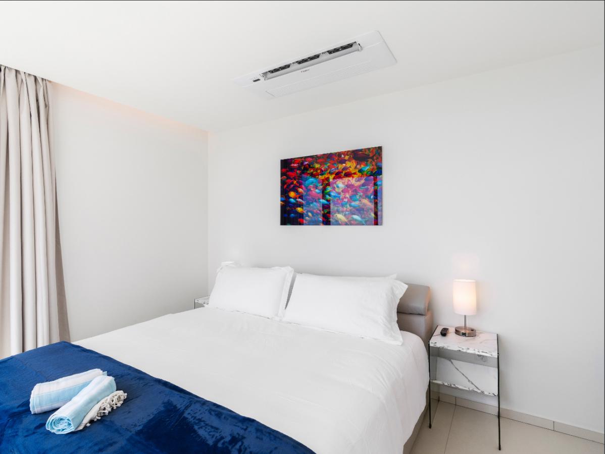 St Maarten real estate: Fourteen Mullet Bay Sub-penthouse ocean view height ceiling 19th floor B1901