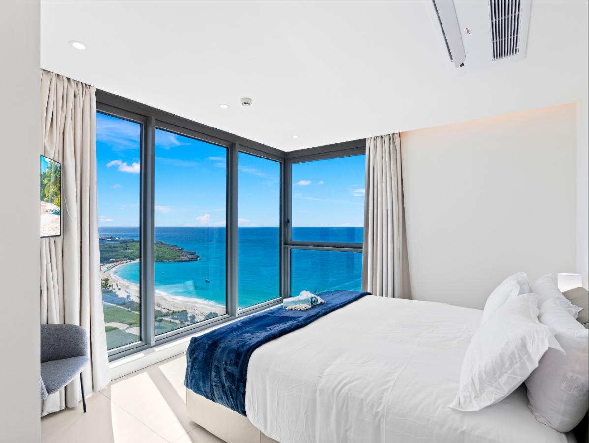 St Maarten real estate: Fourteen Mullet Bay Sub-penthouse ocean view height ceiling 19th floor B1901