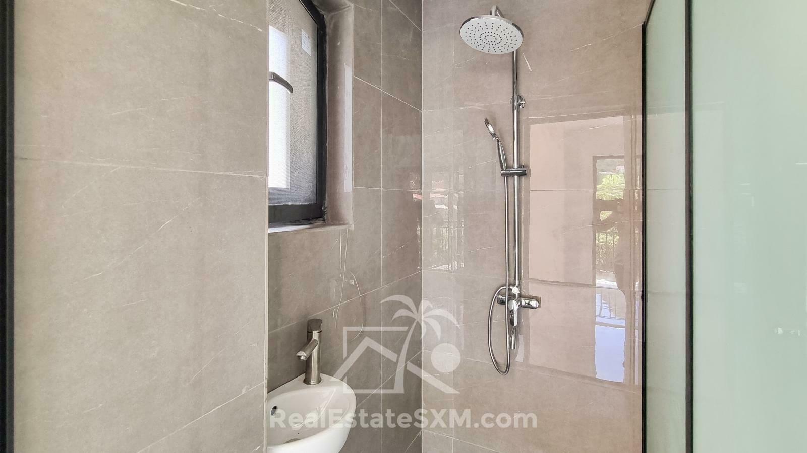 3-bedrooms condo in St Maarten, St John's. Brand new. Modern. Two levels. High ceilings