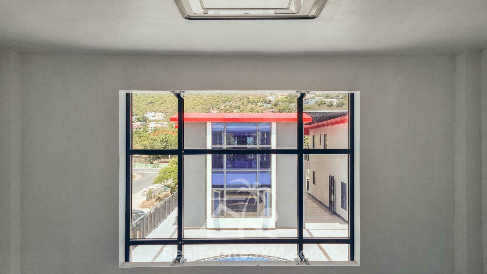 3-bedrooms condo in St Maarten, St John's. Brand new. Modern. Two levels. High ceilings
