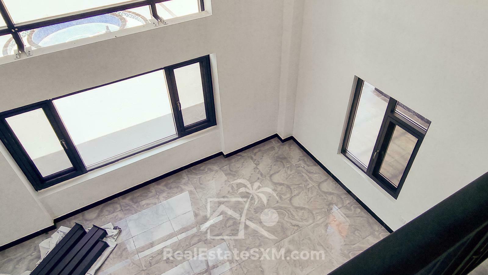 3-bedrooms condo in St Maarten, St John's. Brand new. Modern. Two levels. High ceilings