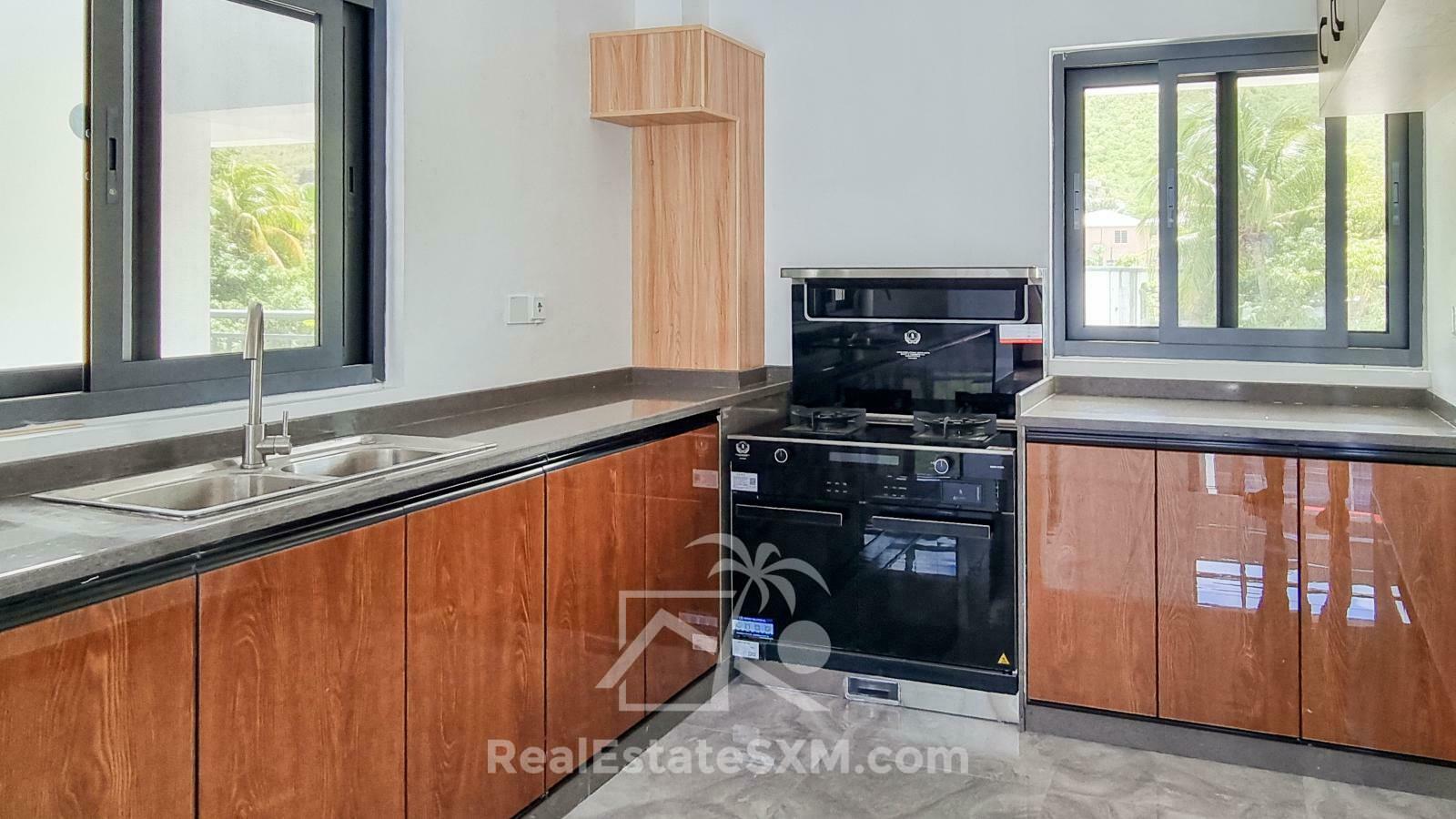 3-bedrooms condo in St Maarten, St John's. Brand new. Modern. Two levels. High ceilings