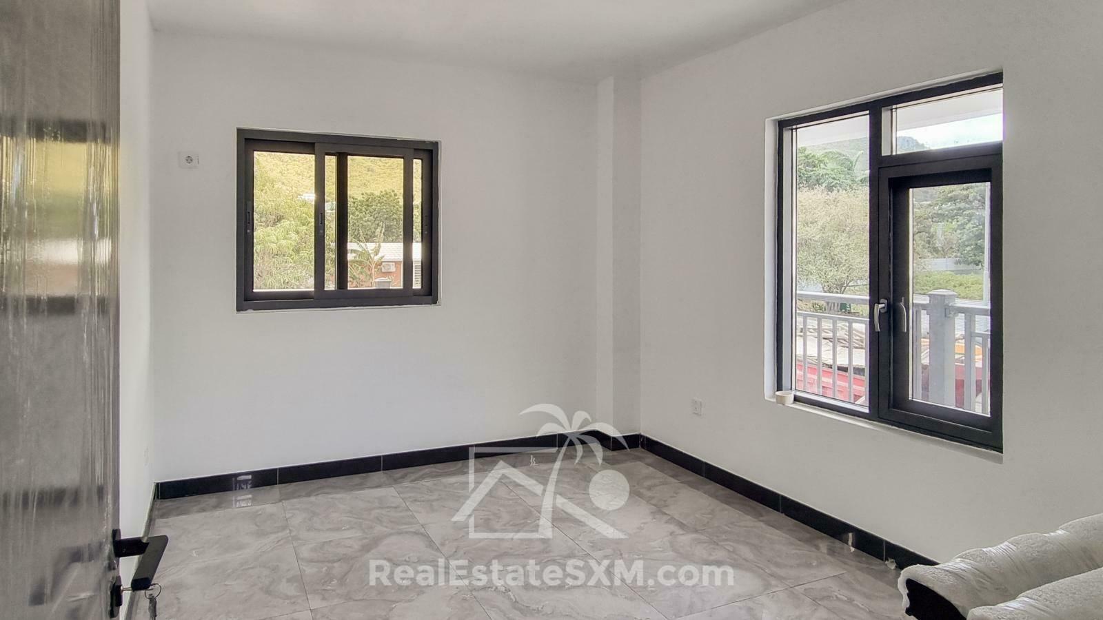 3-bedrooms condo in St Maarten, St John's. Brand new. Modern. Two levels. High ceilings